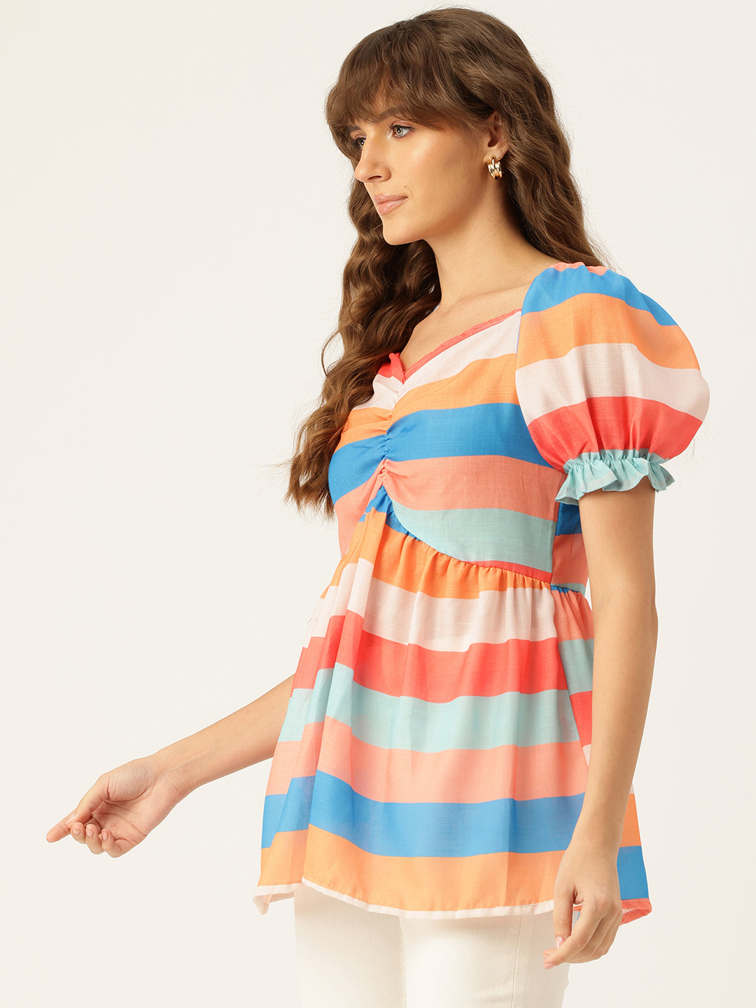 Cropped v-neck peplum puff sleeved top with digital print on linen fabric.