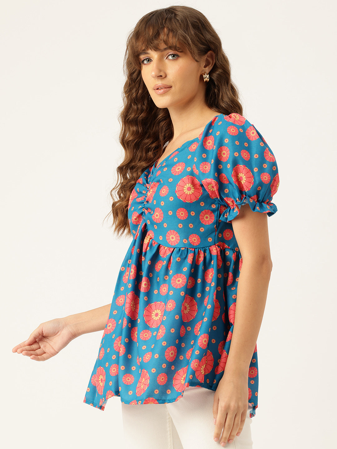Cropped v-neck peplum puff sleeved top with digital print on linen fabric.