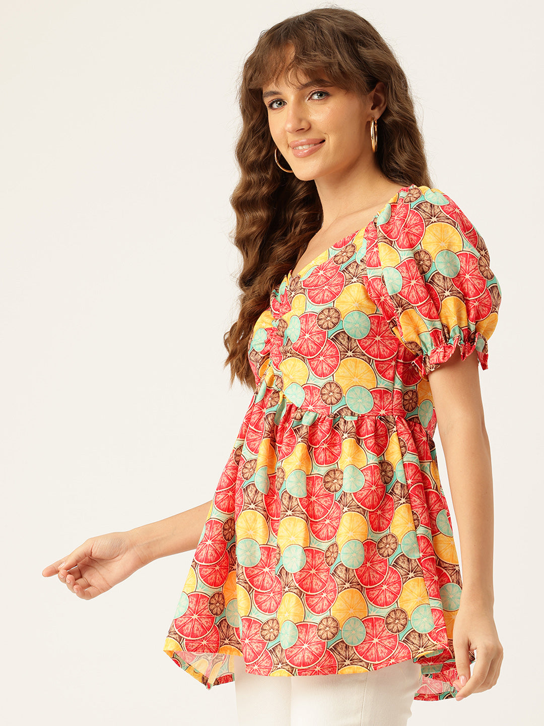 Cropped v-neck peplum puff sleeved top with digital print on linen fabric.