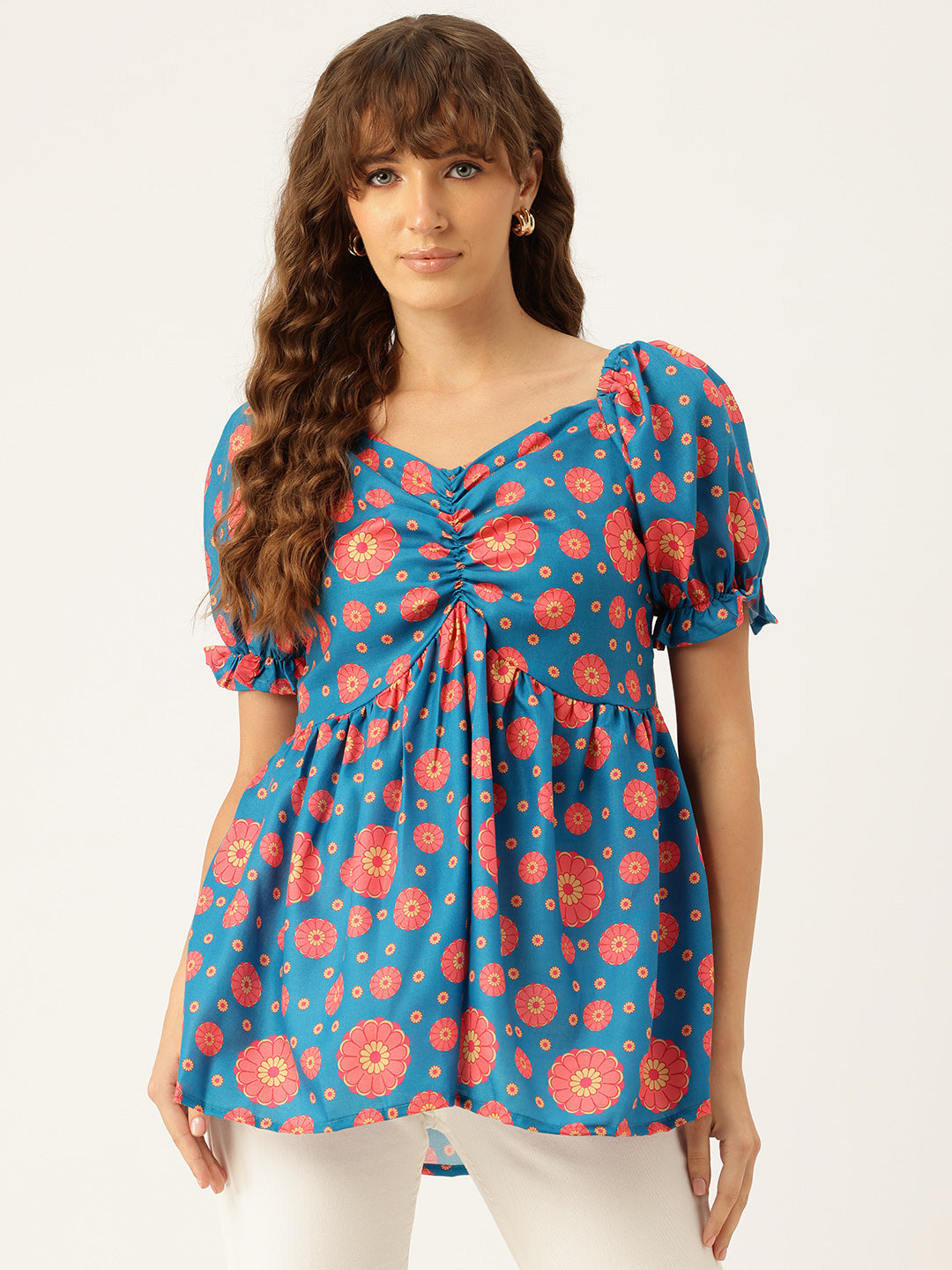 Cropped v-neck peplum puff sleeved top with digital print on linen fabric.