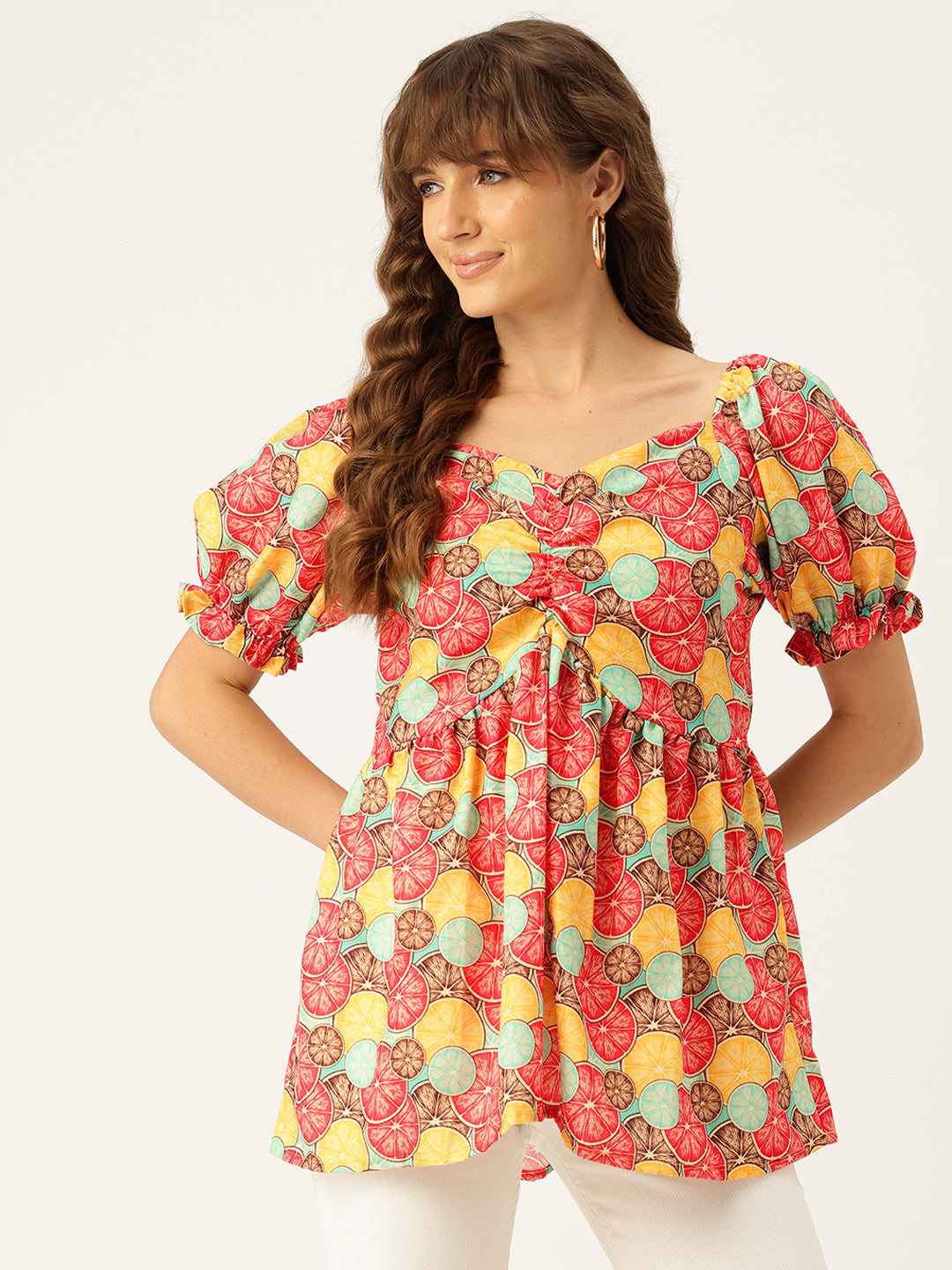 Cropped v-neck peplum puff sleeved top with digital print on linen fabric.