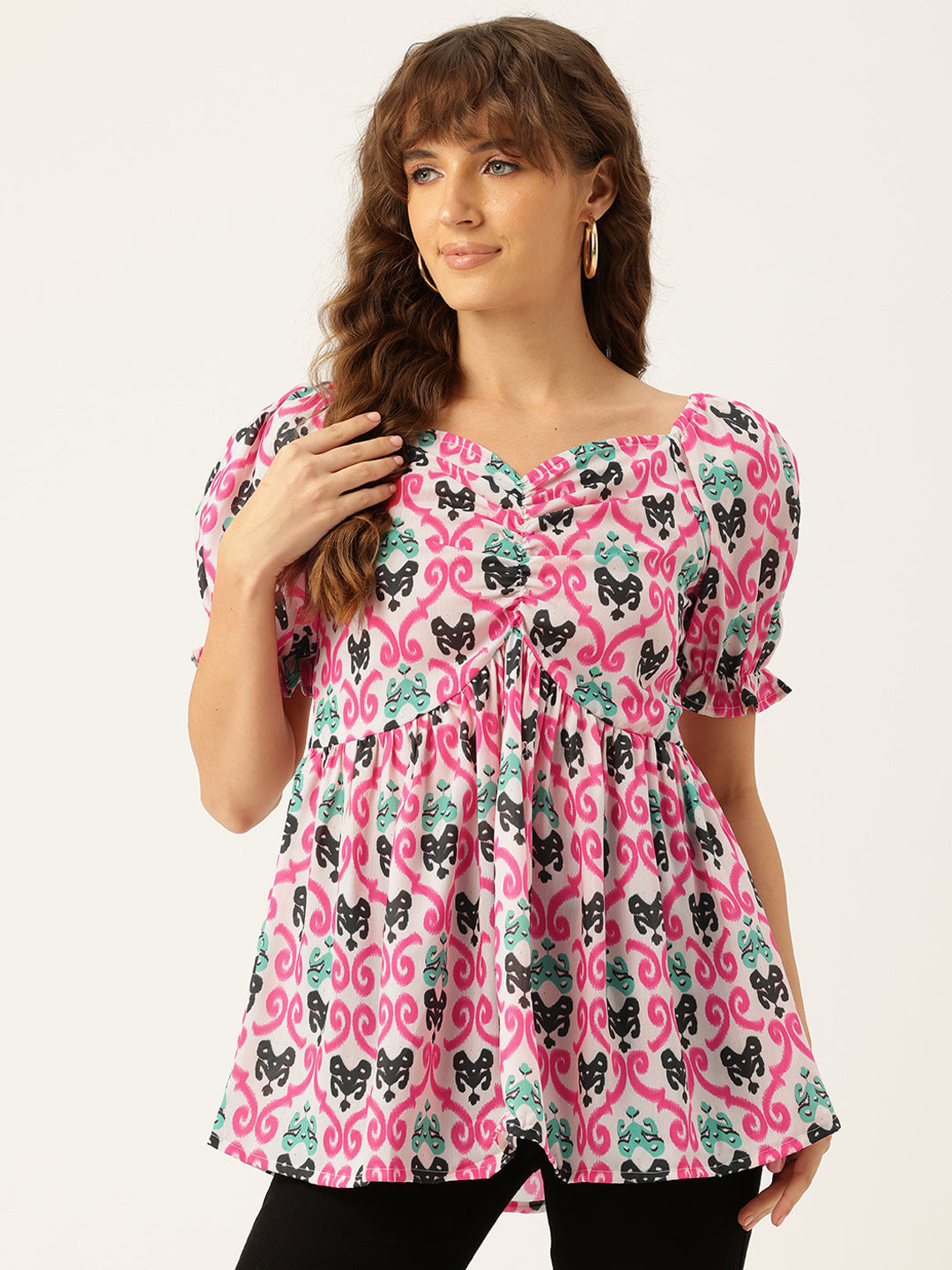 Cropped v-neck peplum puff sleeved top with digital print on linen fabric.