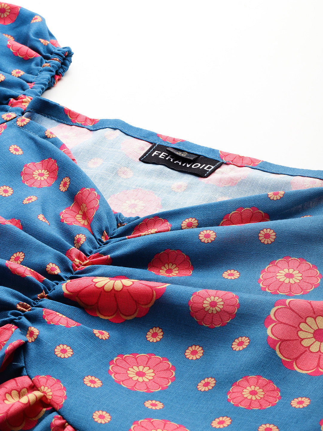 Cropped v-neck peplum puff sleeved top with digital print on linen fabric.