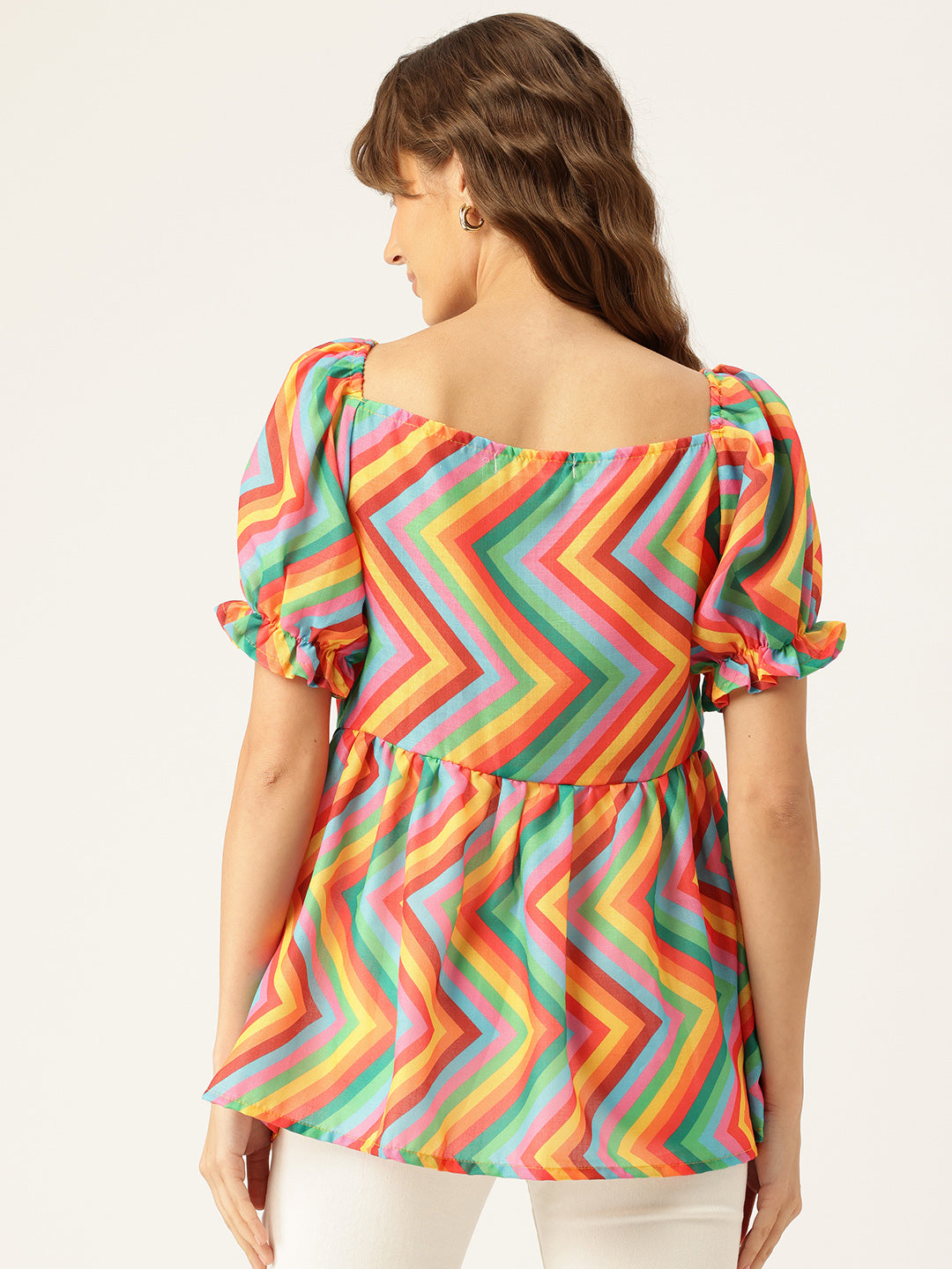 Cropped v-neck peplum puff sleeved top with digital print on linen fabric.
