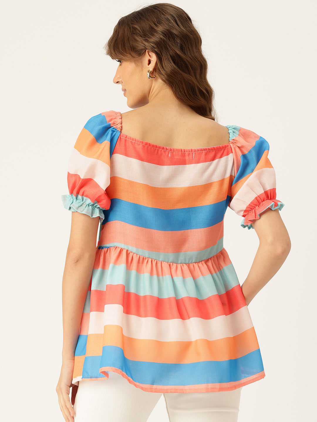 Cropped v-neck peplum puff sleeved top with digital print on linen fabric.