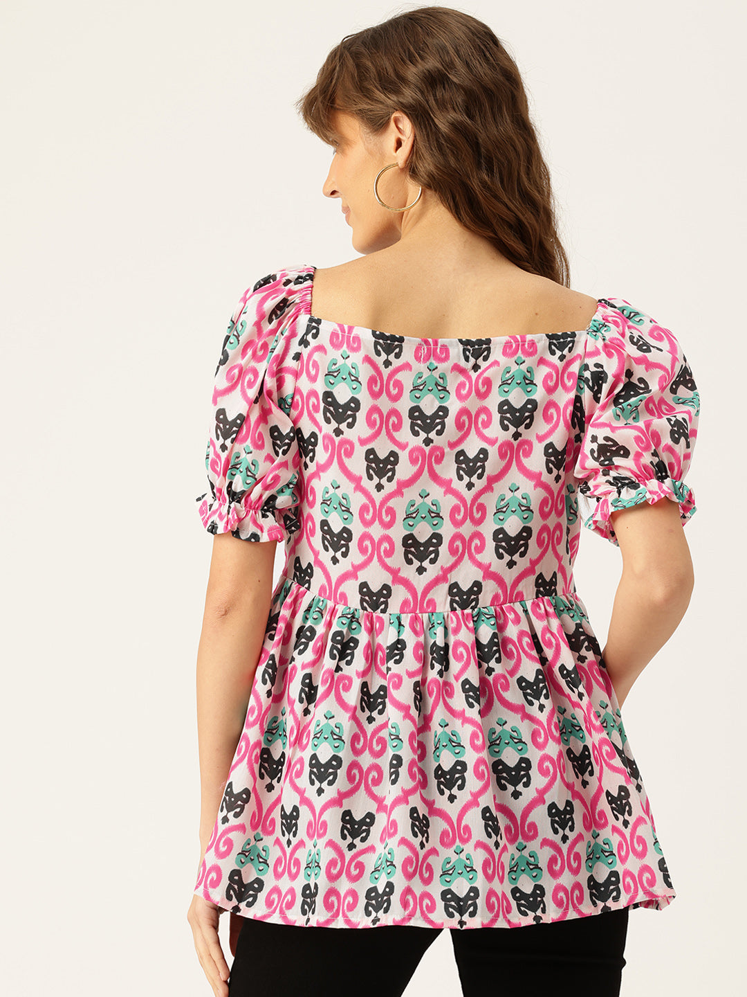 Cropped v-neck peplum puff sleeved top with digital print on linen fabric.