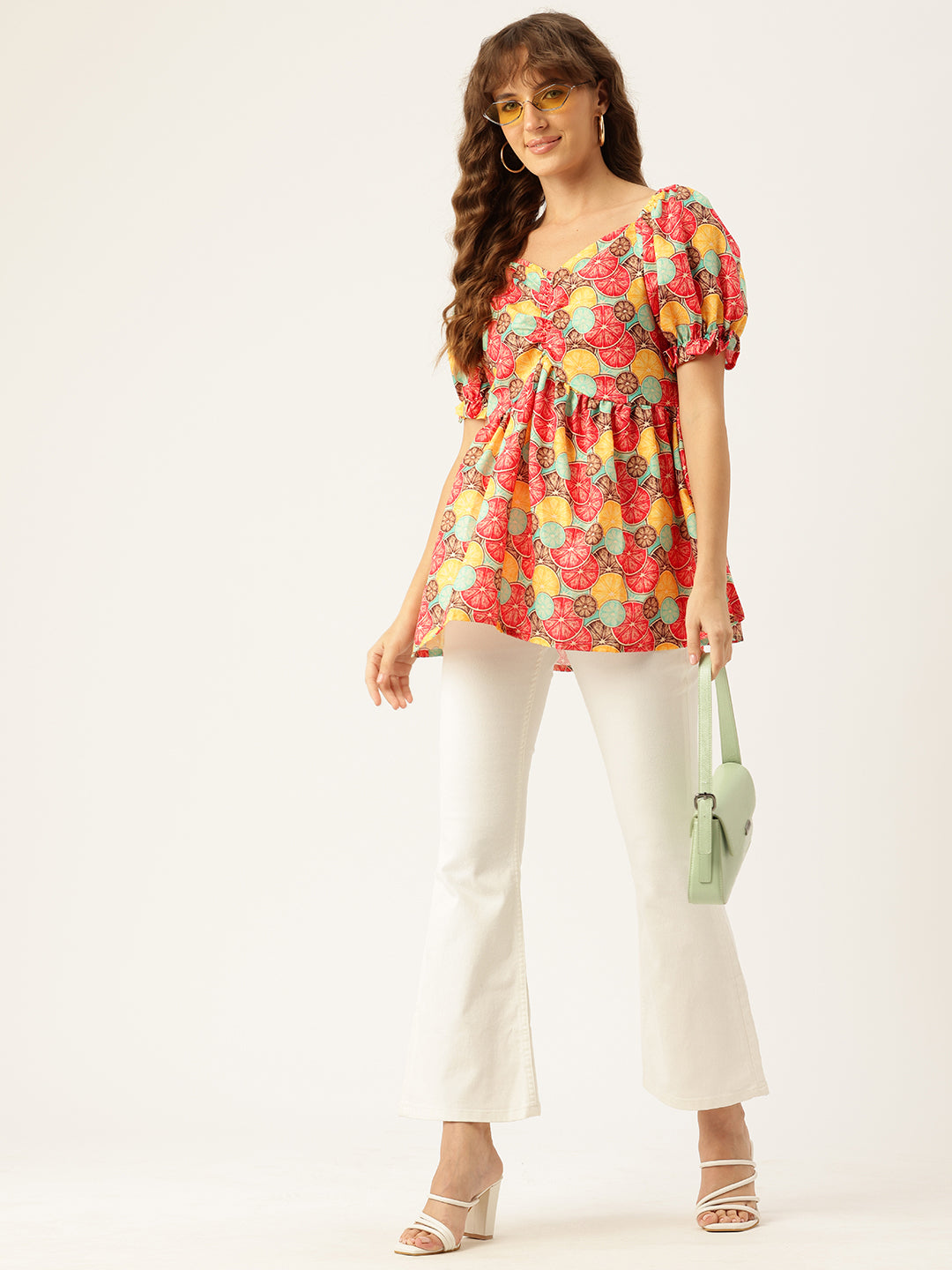 Cropped v-neck peplum puff sleeved top with digital print on linen fabric.