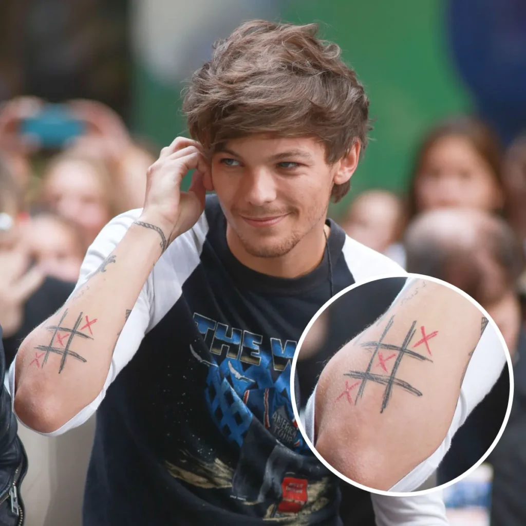 Louis Tomlinson's tattoo of tic tac toe