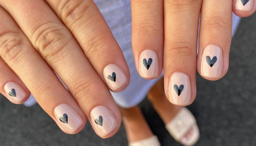 “Step-by-step short nail art DIY tutorial setup with brushes, polish, and top coat.”