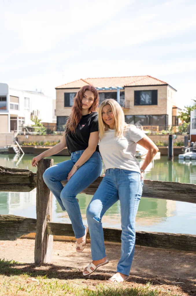 “Model wearing Levi’s 311 shaping skinny jeans in dark wash for curvy figure”