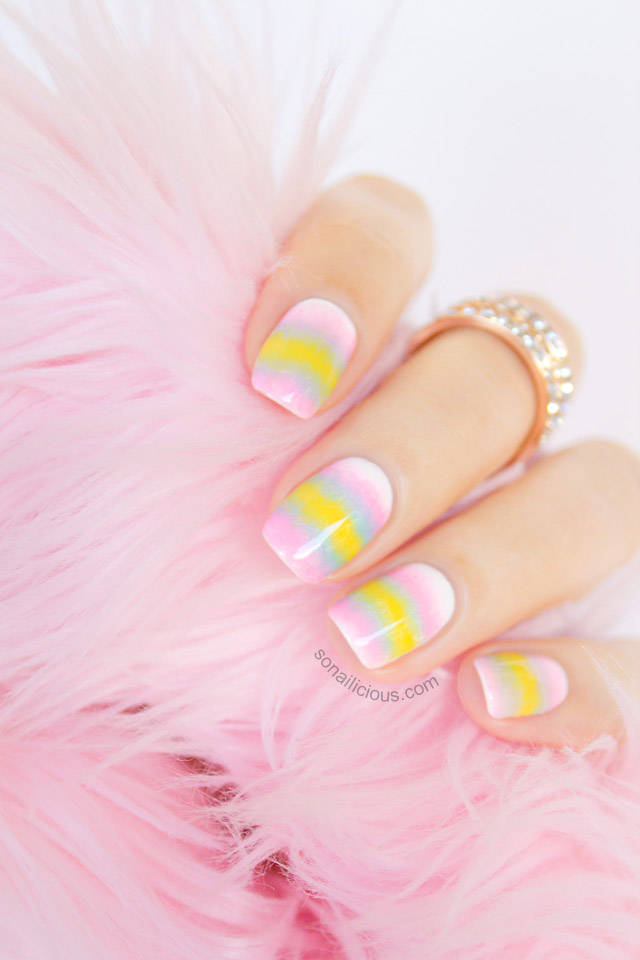 “Pastel ombre short nails blending soft pink, lavender, and mint shades.”